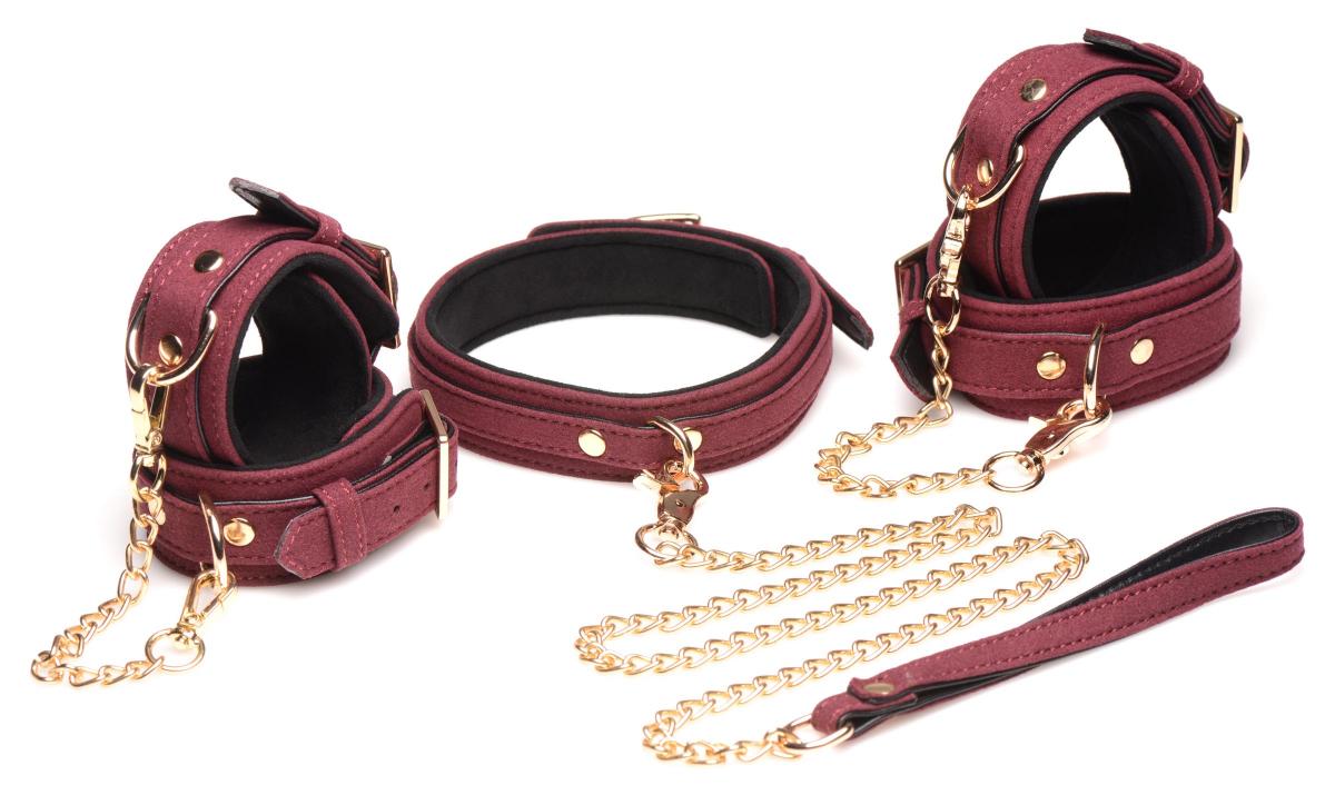 Burgund BDSM Fesselset 1 Master Series Burgunder BDSM Fesselset 6-teilig verstellbar, aus veganem Wildleder mit goldenen Details. Exklusive bei RaiX Shop Konstanz kaufen