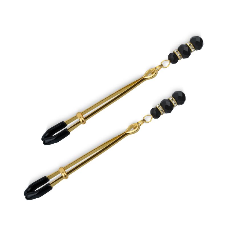 Pinces à mamelons dorées avec des perles noires 3