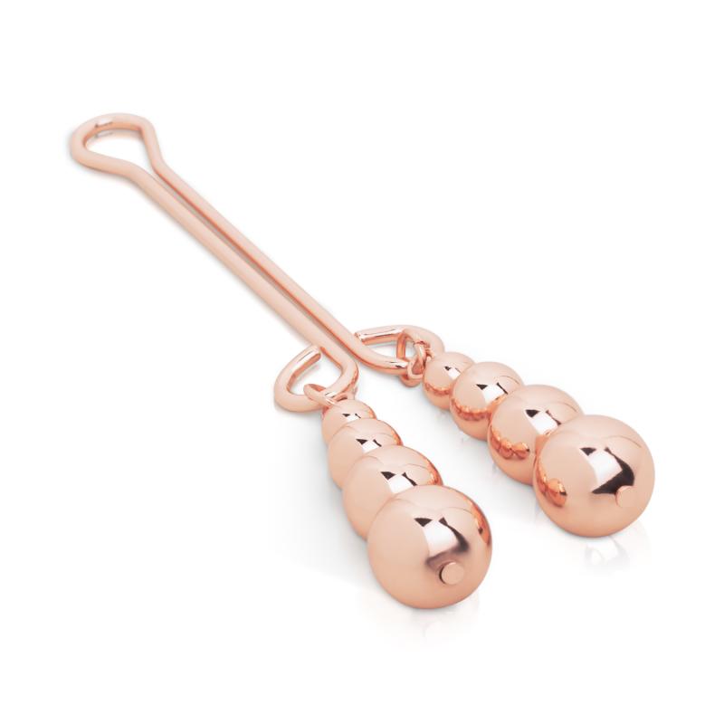 - Pince Clitoris - Poids SubtilD&eacute;couvrez une stimulation raffin&eacute;e avec cette pince pour clitoris, con&ccedil;ue pour celles et ceux qui recherchent des sensations ci 2